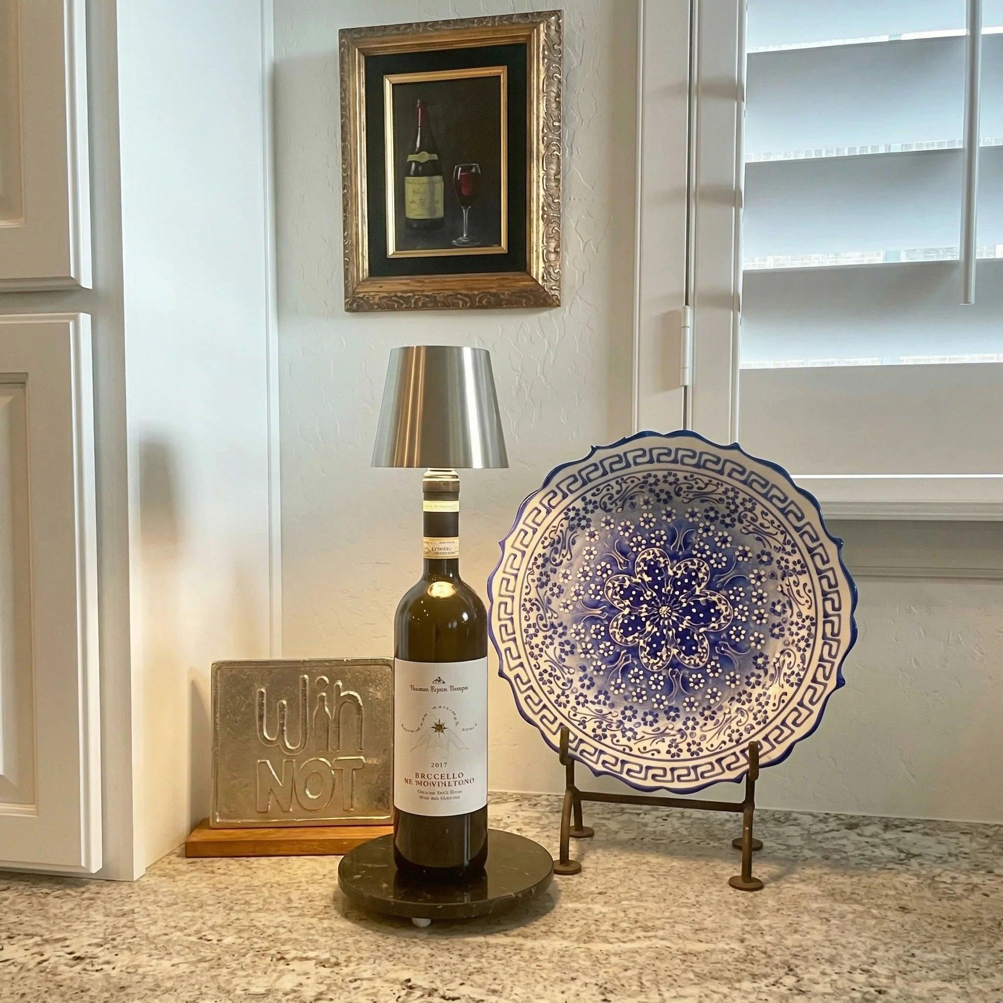 Dimmable color-changing bottle lamp on a bar cart