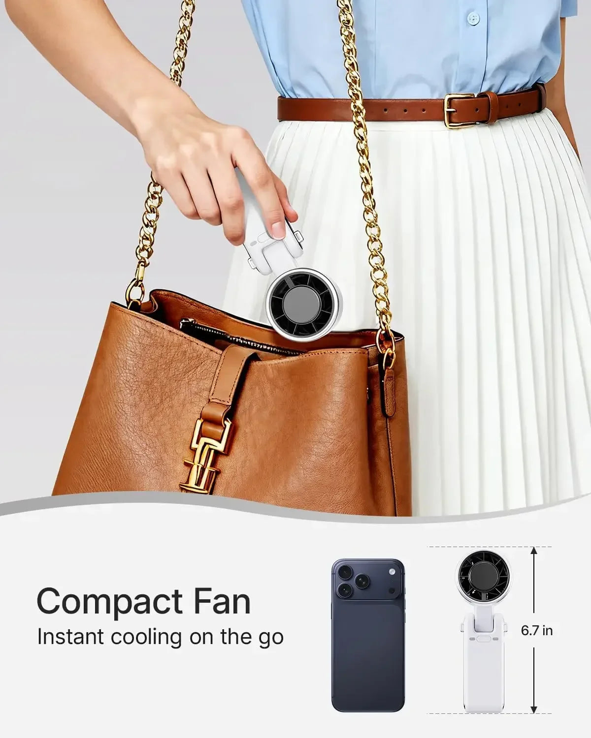 Handheld fan used at an outdoor summer event