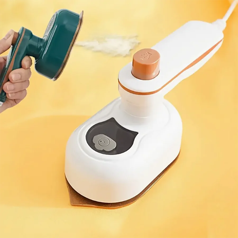 Close-up of mini steam iron steam vents and fabric-safe soleplate